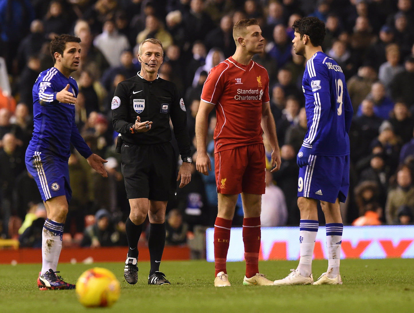 <b>Footballers get up close and personal on the pitch</b>